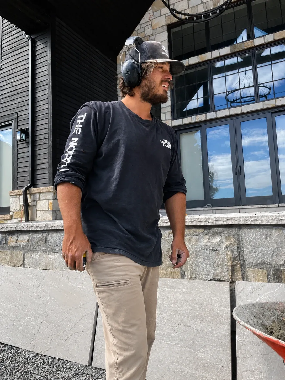 Brandon Boire beside custom stonework